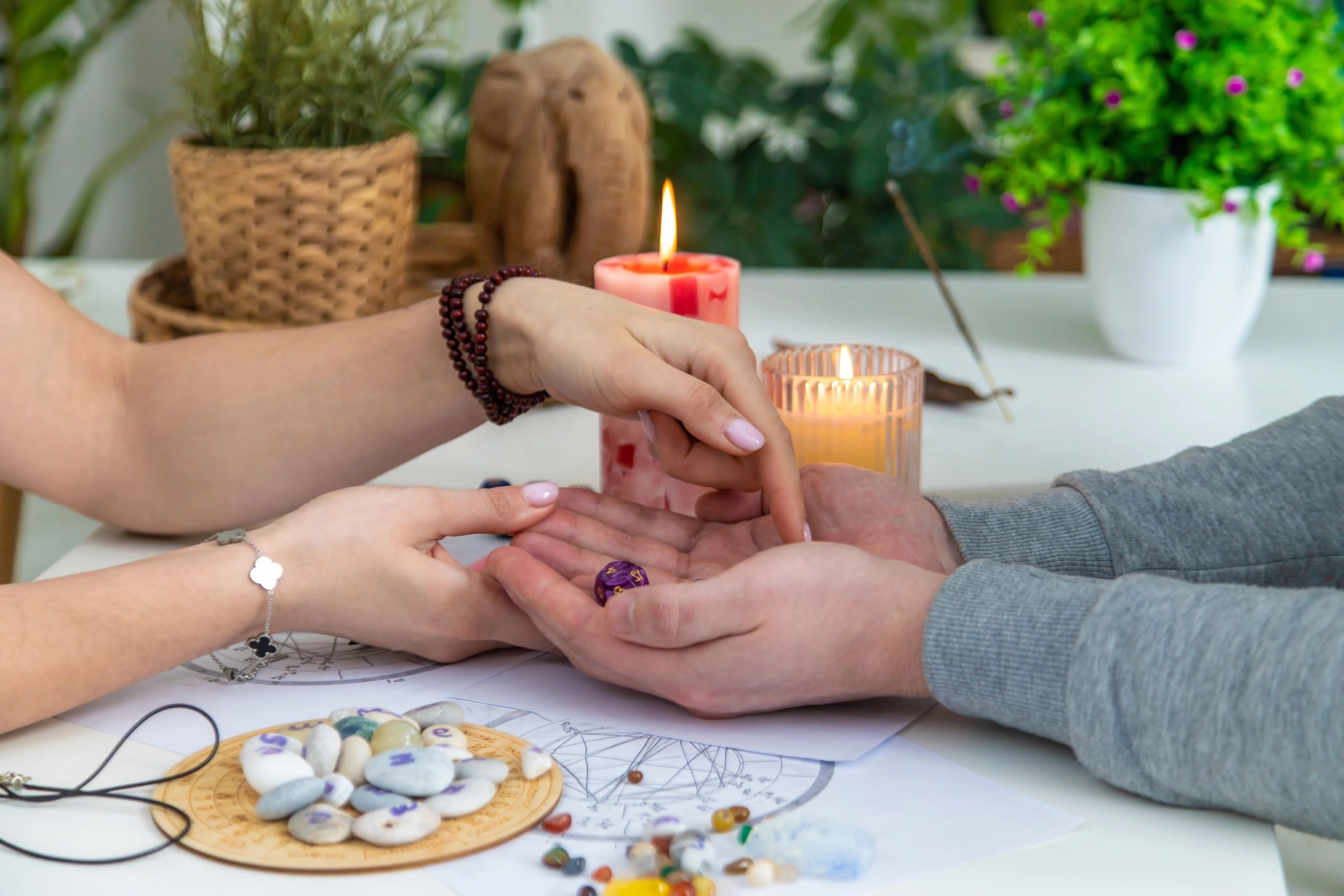 Spiritual reading session with candles and crystals